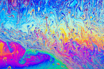 Psychedelic abstract formed by light reflecting off soap bubble