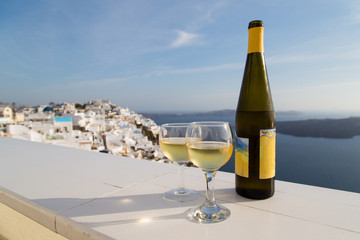 white wine on the balcony in Santorini