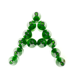 Alphabet letter A made up of green empty  bottles isolated on white. Characters create using Empty beer Bottles on white background.