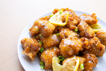 Sticky Chinese Lemon Chicken on the plate