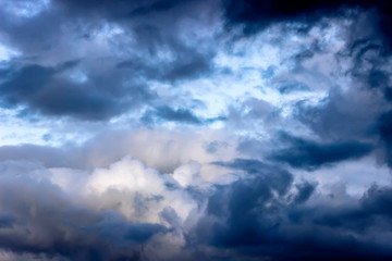 Obraz premium Dramatic sky with clouds on sunset evening. Natural abstract background.