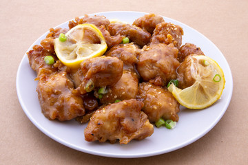 Sticky Chinese Lemon Chicken on the plate