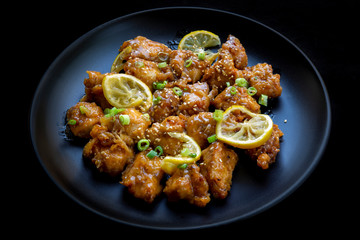 Sticky Chinese Lemon Chicken on the plate