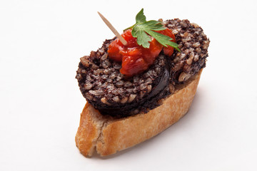  typical spanish food pintxo of black pudding