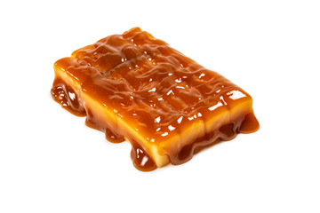 Tasty caramel candy isolated on white background.