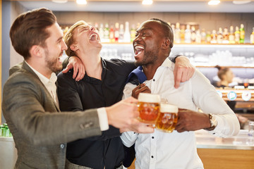 Friends drinking beer on a men's evening