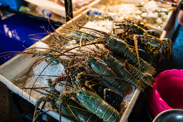 Grilled fresh seafood food market. Barbeque Cooking BBQ seafood on fire im Thailand street market