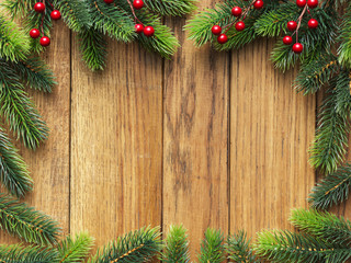 Fototapeta na wymiar Christmas fir tree on wooden board