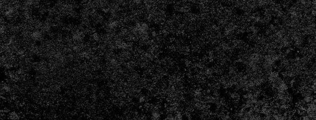 Black background of a texture of cement wall, stone and concrete, with some little moss - Dark stage background - Large panoramic format