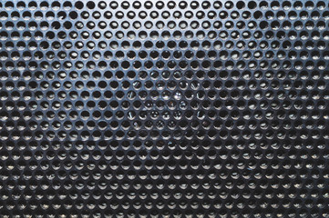Grid pattern surface. dusty speaker mesh texture. perforated plastic. abstract background