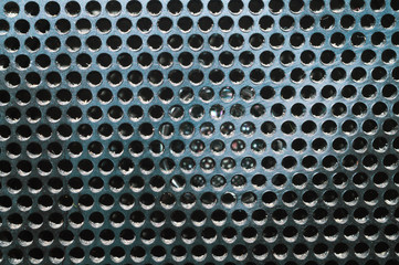 Grid pattern surface. dusty speaker mesh texture. perforated plastic. abstract background