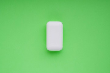 White soap on green