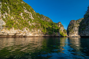 Fototapeta na wymiar The beaches of Ko Phi Phi Islands and the Rai ley peninsula are framed by stunning limestone cliffs. They are regularly listed between the top beaches in Thailand.