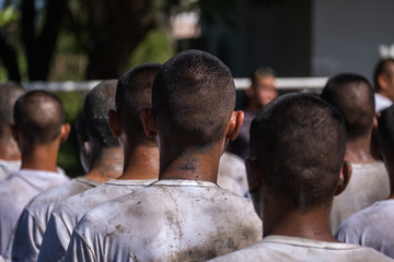Soldiers game on military training ground ( battle camp ). Action. Operation Trainer giving training to military soldiers at boot camp Heavily Hot sun