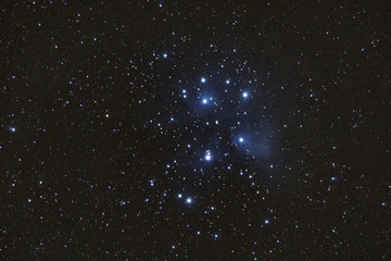 Obraz na płótnie Canvas M45 - the Pleiades, Seven Sisters, Deep Sky Astrophoto, Science. the plejades M45 open star cluster in the constellation of taurus.