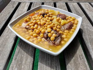 Chickpeas with meat ham and sausage - Traditional spanish meal