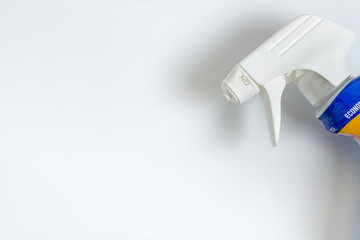 Close up of disinfectant household cleaner spray on white background