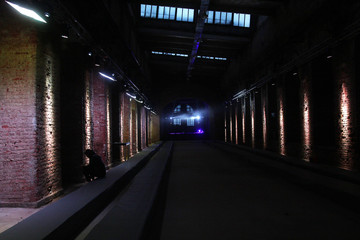 illuminated interior of an abandoned building