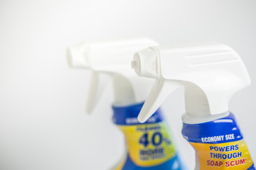 Close up of disinfectant household cleaner spray on white background