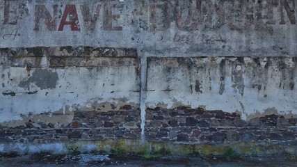old brick wall with peeling paint background
