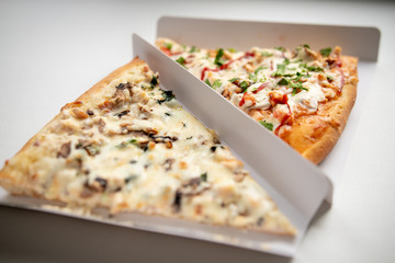 slice of delicious pizza delivered home