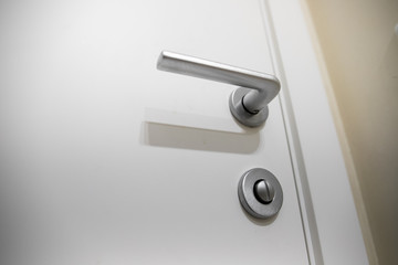 Modern, contemporary satin handle and keyhole detail