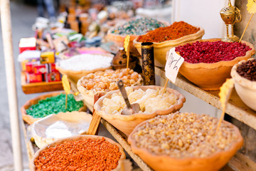 Arabian colorful spices at street market in old city of Jerusalem, Israel