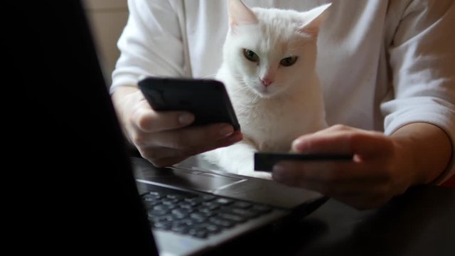 Internet banking using a smartphone. Life style during quarantine. Convenient payment using a smartphone or digital device. Communication through the app for sale in the store. Man shopping online
