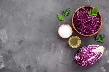 Red cabbage - coleslaw, cold-slaw - on grey kitchen desk top-down copy space