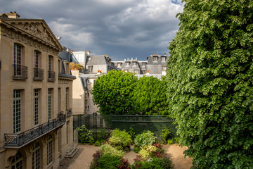 Paris, France - April 24, 2020: Typical roofs of haussmann buildings in Paris