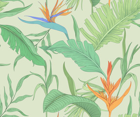 Seamless pattern with tropical flowers and palm leaves