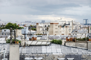 vue toits de paris gris nuage immobilier urbain