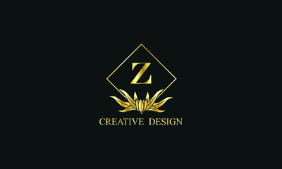 Fototapeta premium Elegant design of royal vector logo with letter Z on black background. Stylish golden floral monogram for business, restaurant, boutique, cafe, hotel, labels and more.