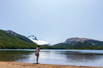 girl on the mountain lake