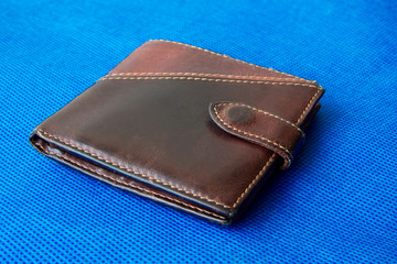 Empty wallet with no money in the background.
Bankruptcy is an empty wallet.
It is not possible to repay the loan and mortgage.
Old and empty brown wallet