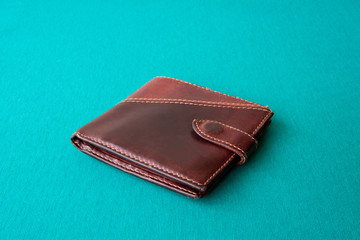 Empty wallet with no money in the background.
Bankruptcy is an empty wallet.
It is not possible to repay the loan and mortgage.
Old and empty brown wallet