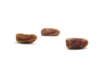 Tunisian dates (kurma tunisia) isolated on white background, perfect for breakfasting during ramadan