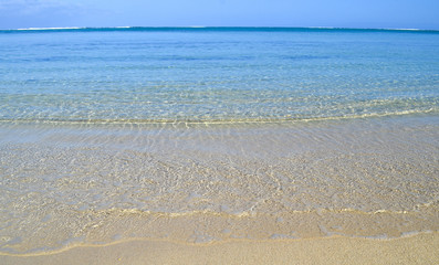 tropical white sand beach with turquoise water