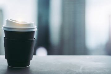 Background of black coffee cup refreshing enjoy morning before work from home video conference call meeting with cafe rooftop traffic view from window during coronavirus covid city lockdown quarantine