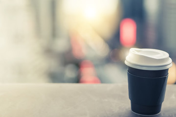 Background of black coffee cup refreshing enjoy morning before work from home video conference call meeting with cafe rooftop traffic view from window during coronavirus covid city lockdown quarantine