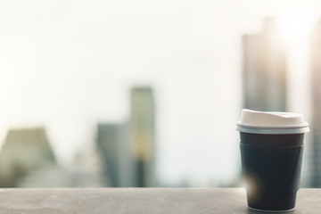 Background of black coffee cup refreshing enjoy morning before work from home video conference call meeting with cafe rooftop traffic view from window during coronavirus covid city lockdown quarantine