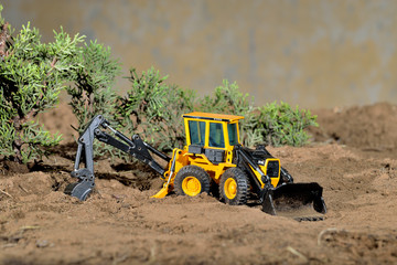 diorama maqueta juguete construcción maquina excavadora amarilla