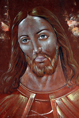 Jesus head on wooden background