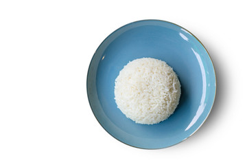 Cooked white jasmine rice on blue plate.
