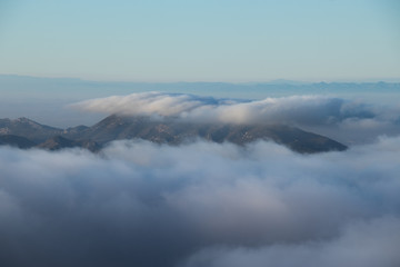 Panoramic view of sea of clouds over mountain peaks