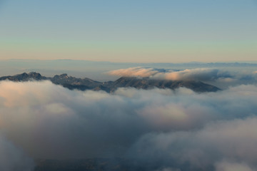 Panoramic view of sea of clouds over mountain peaks