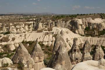Panoramic view of rocky landscape with blue sky