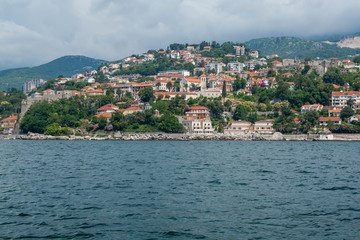 Fototapeta na wymiar Budva old town and beach seascape view at Kotor Bay in Montenegro 