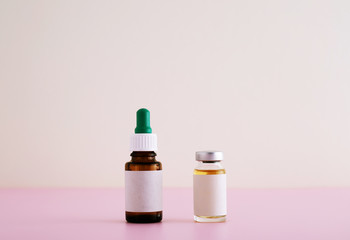 Two types of plastic and glass vials
