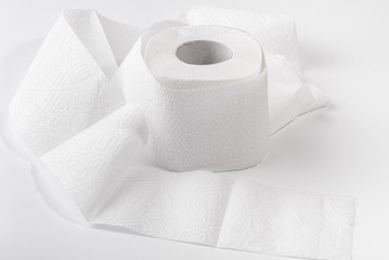 A roll of toilet paper on a white background.